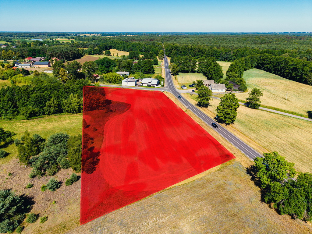 Działka usługowa przy drodze asfaltowej – 7894 m²