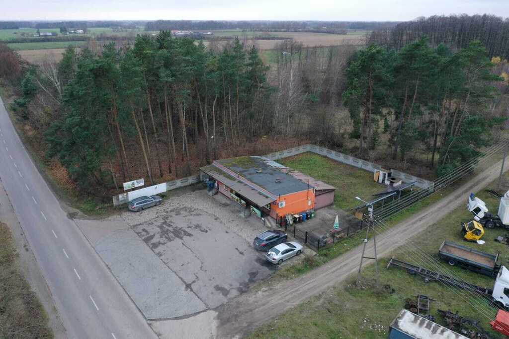 Dwie działki przy drodze powiatowej z biznesem!