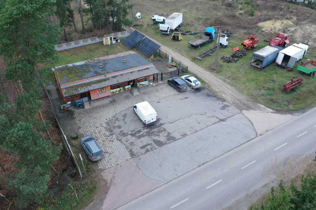 Dwie działki przy drodze powiatowej z biznesem!
