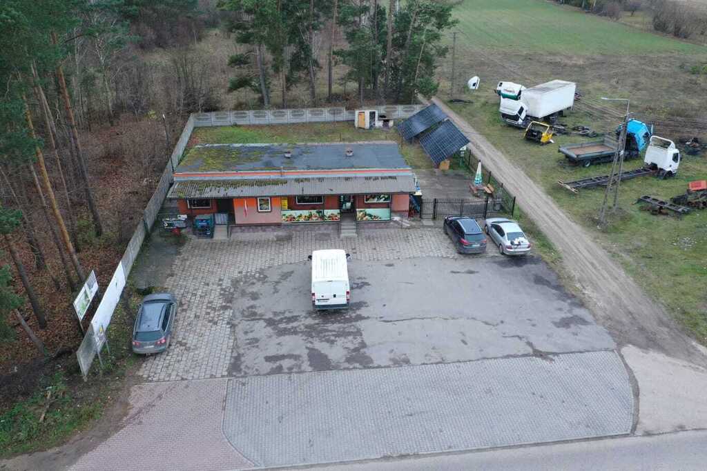 Dwie działki przy drodze powiatowej z biznesem!