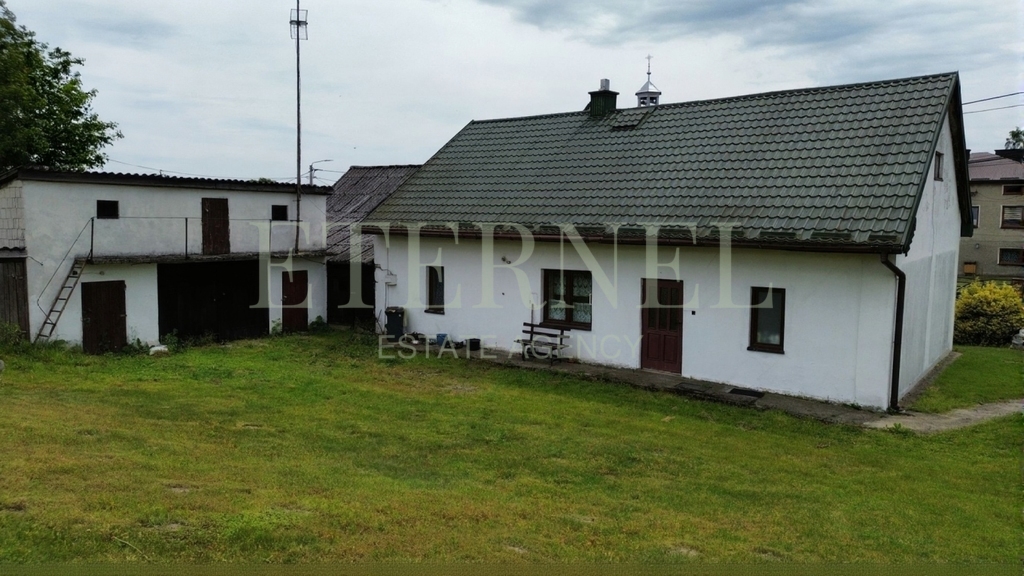 Działka budowlana zabudowana 1490 m2