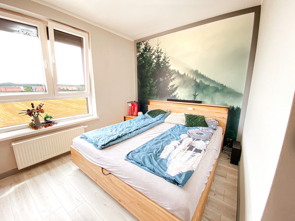 Dwupoziomowe mieszkanie z antresolą i balkonem