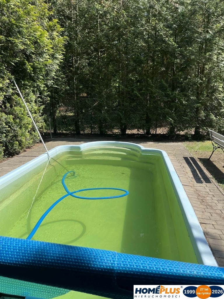 Domek z basenem za wałem Bugu przy plaży Arciechów