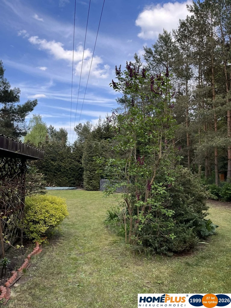 Domek z basenem za wałem Bugu przy plaży Arciechów