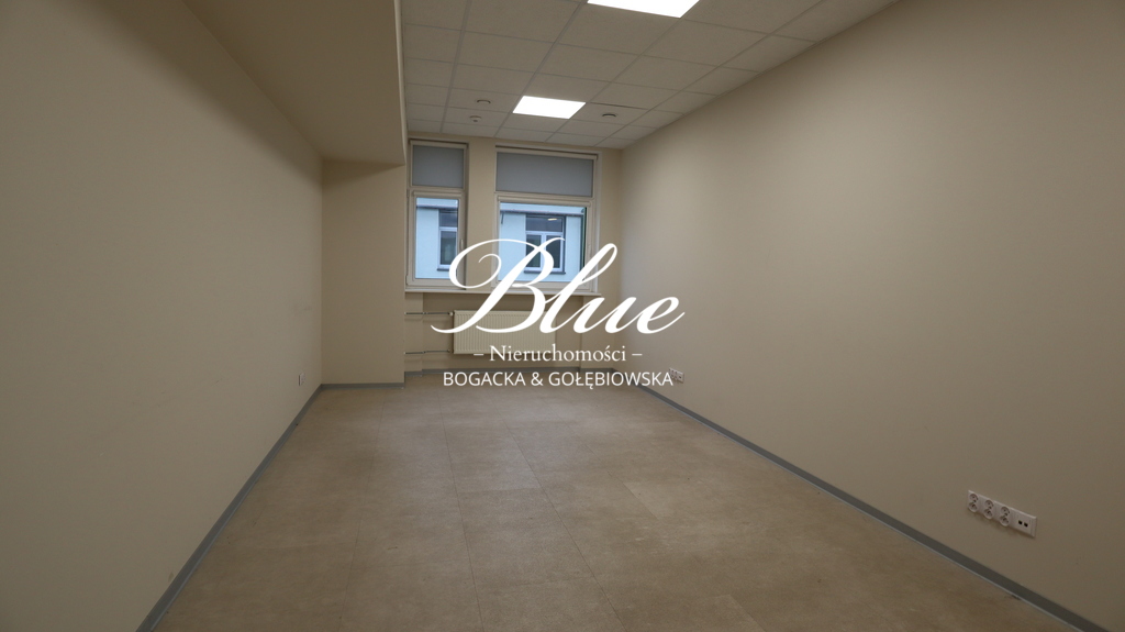 Pomieszczenia biurowe  z miejscami postojowymi